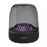 Harman Kardon Aura Studio 4 Bluetooth speaker with iconic transparent dome and themed lighting